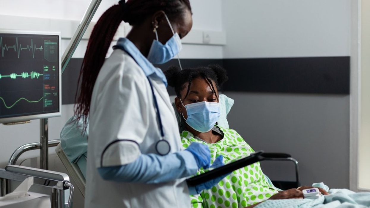 Black woman and doctor