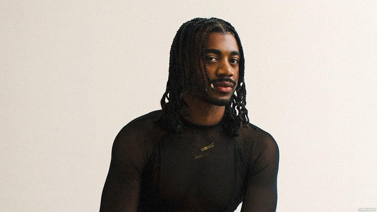 Bronze Avery poses in all-black ensemble.