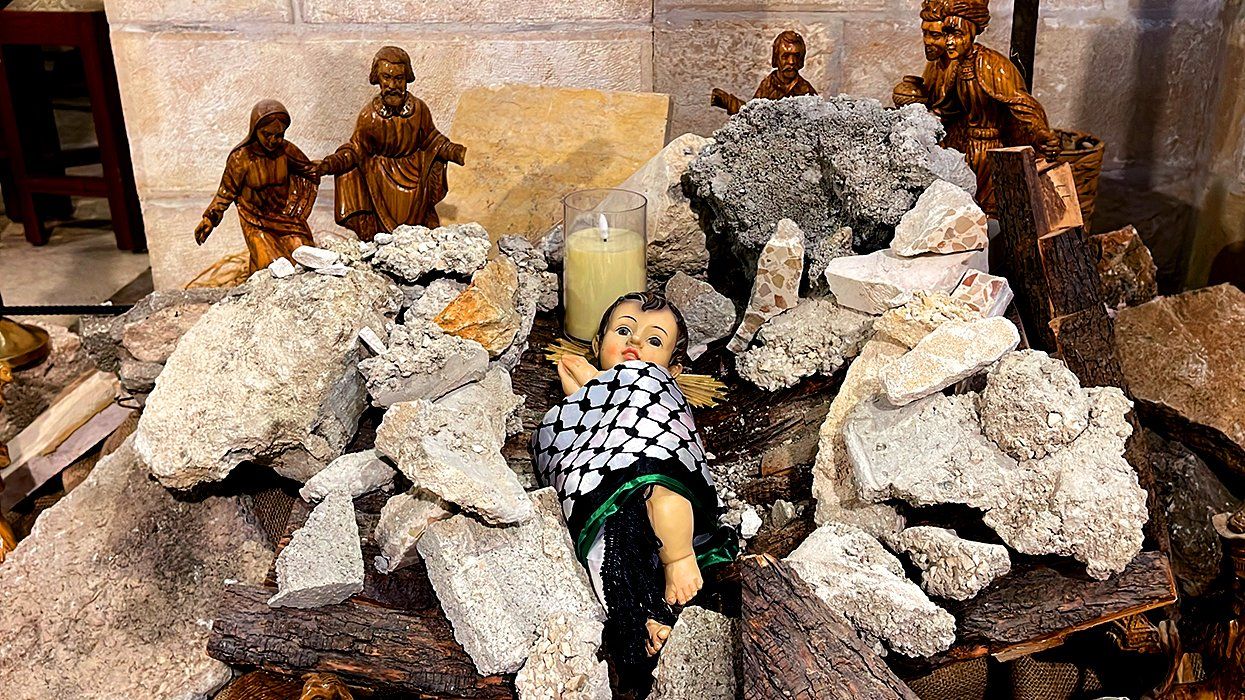 Christmas tree decorations war debris Evangelical Lutheran Christmas Church Bethlehem West Bank rubble destruction Gaza