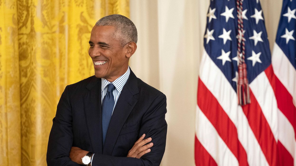 Former President Barack Obama posing