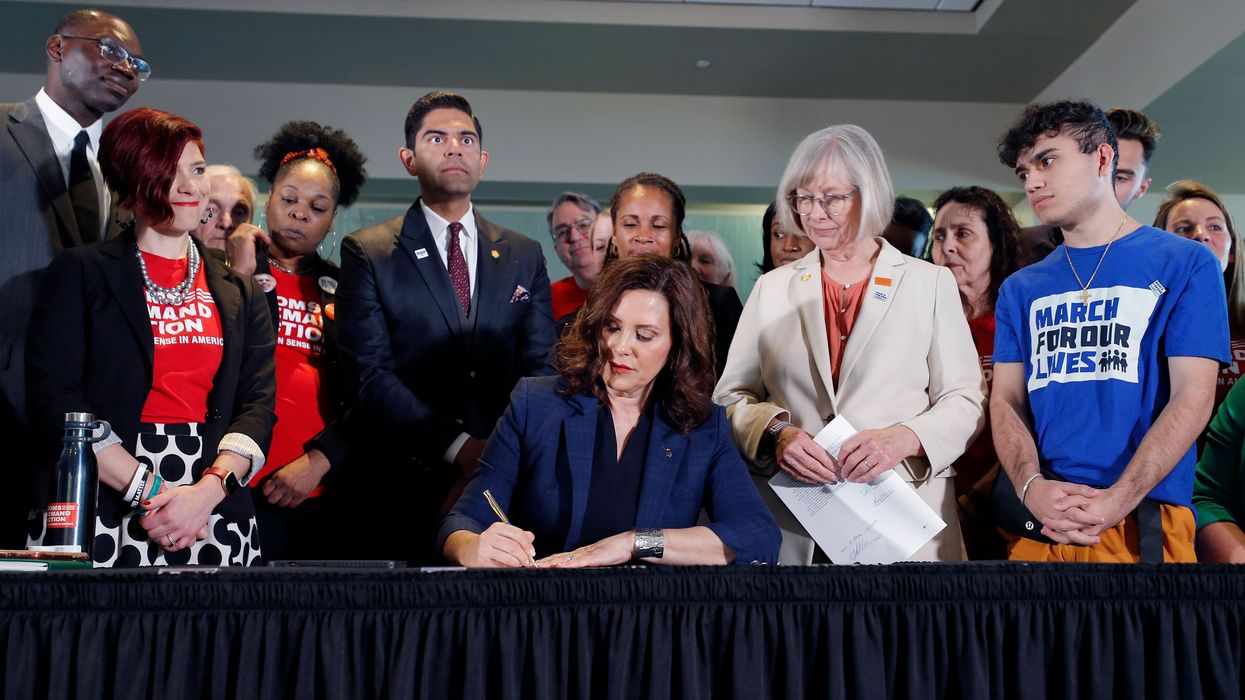 Gretchen Whitmer gun bill signing