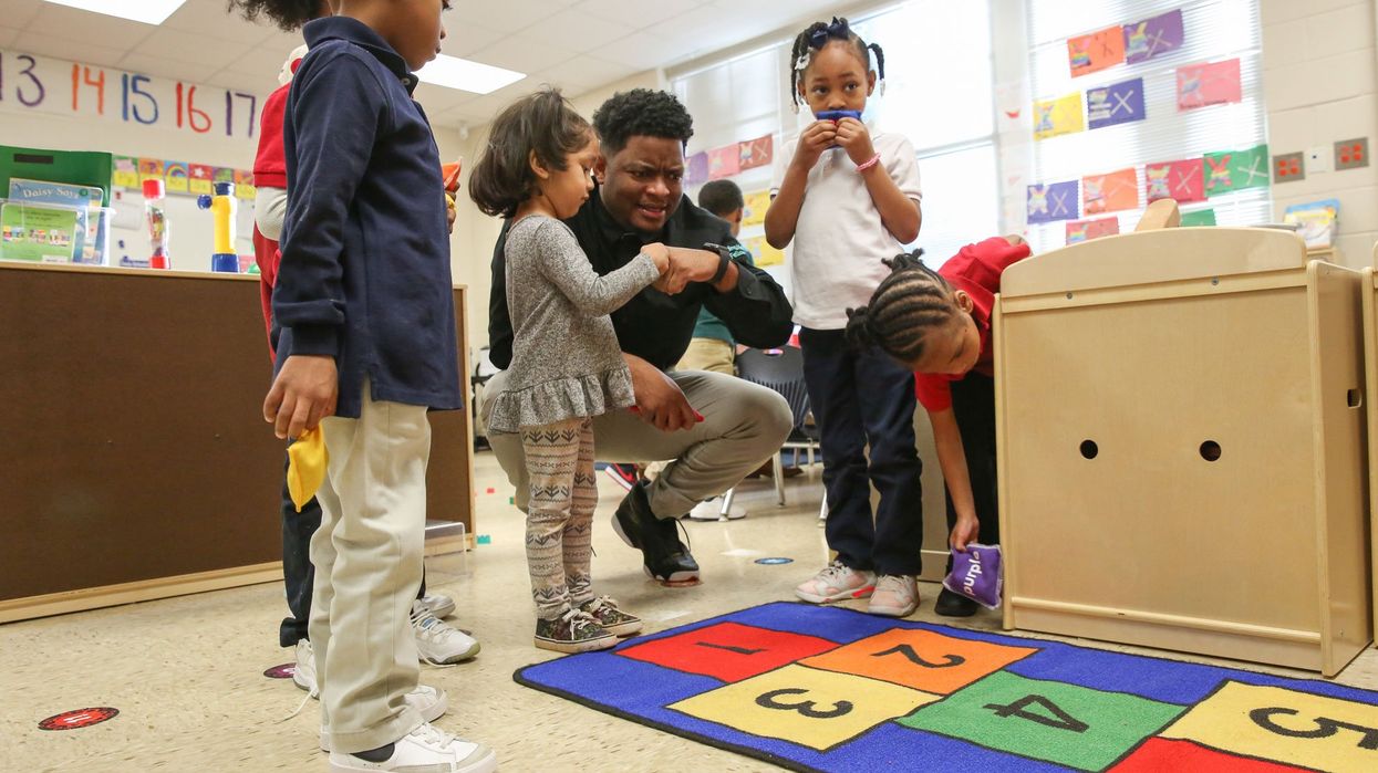 Johnathon Hines w/ pre-K students
