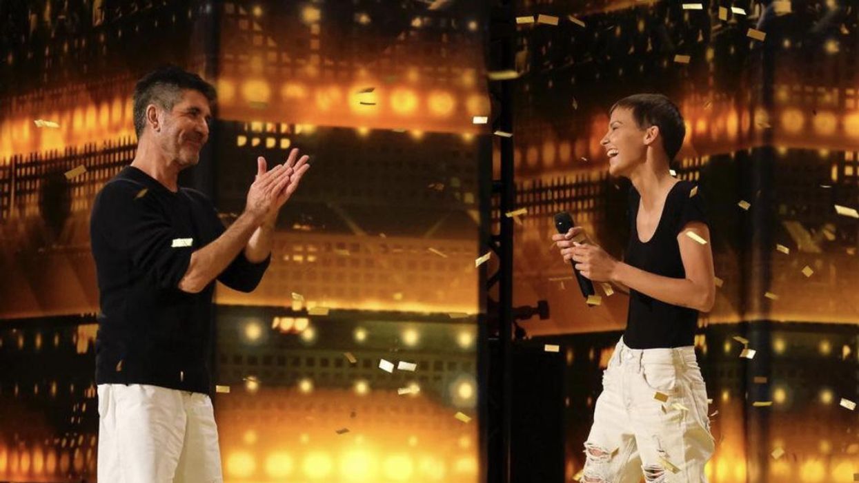 AGT's Simon Cowell Pushes Golden Buzzer For Cancer-Stricken Singer