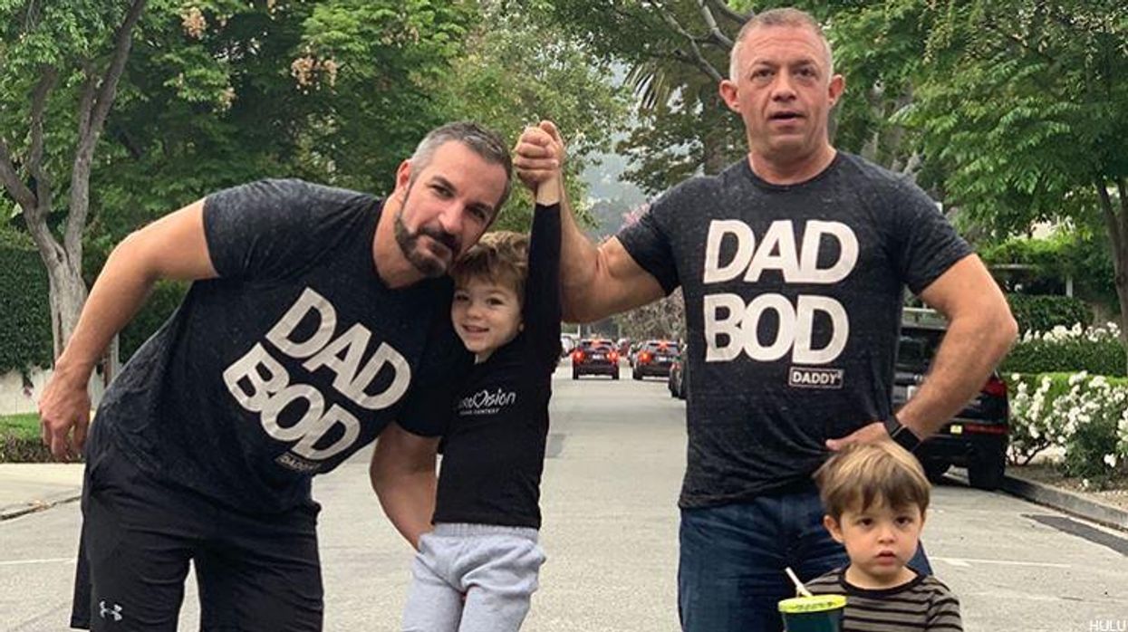 Yan Dekel (L) and Alex Maghen with their children